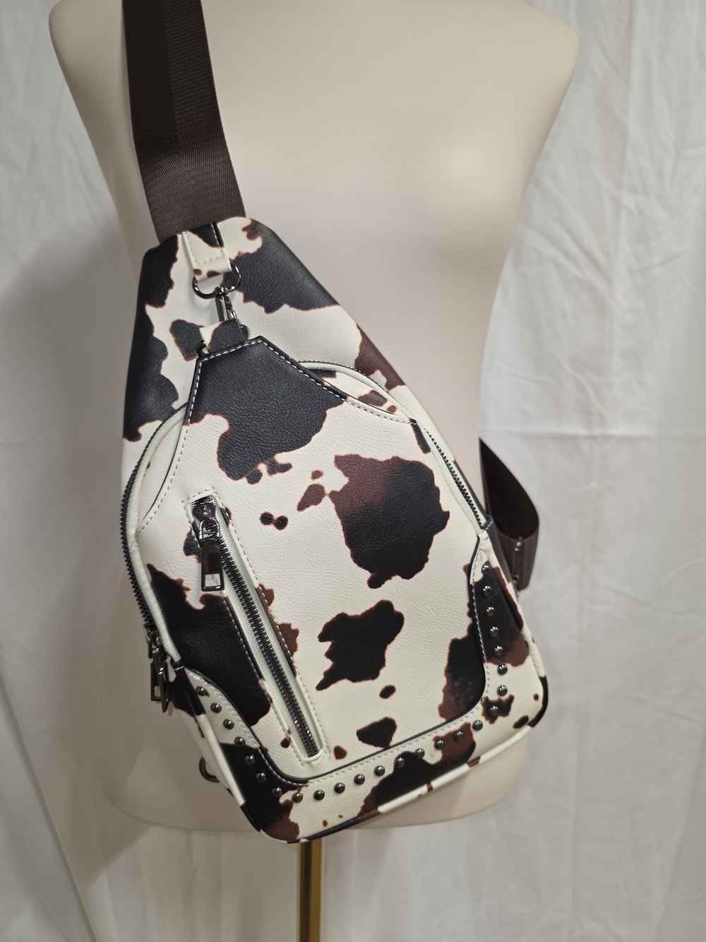 Cowhide-Print Crossbody Sling Bag in White and Brown